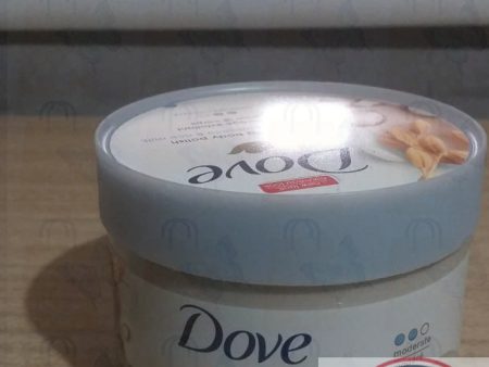 Dove Exfoliating body polish crushed macadamia & rice milk 10.5 oz on Sale